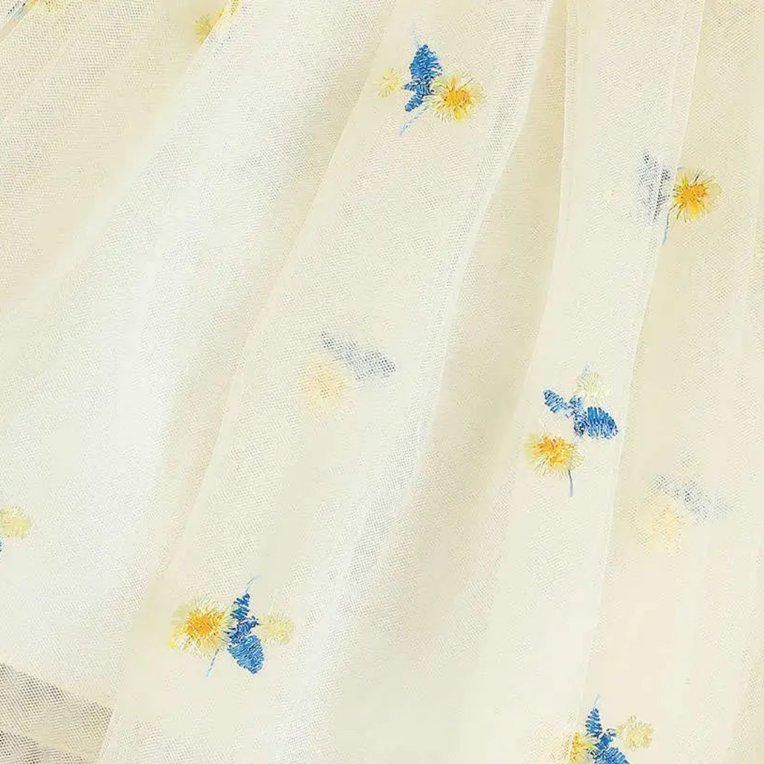 Off white dress with yellow flowers